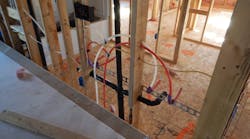 90-degree elbow and two fittings using PEX-A pipe installed in a new home 90-degree elbow and two fittings using PEX-A pipe installed in a new home