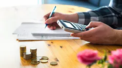 Homebuyer calculating monthly costs