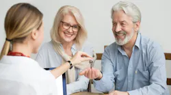 Baby Boomer couple buying new home in hot housing market
