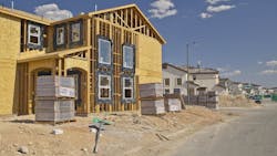 A new home under construction as the price gap between new and existing homes shrinks A new home under construction as the price gap between new and existing homes shrinks