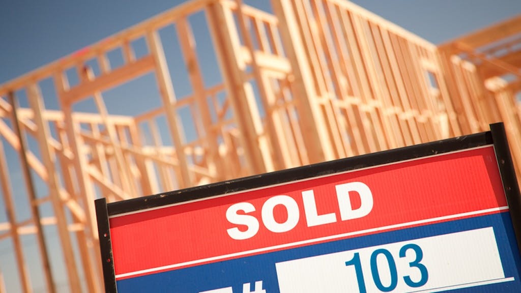 Site of new-construction home with a 'Sold' sign