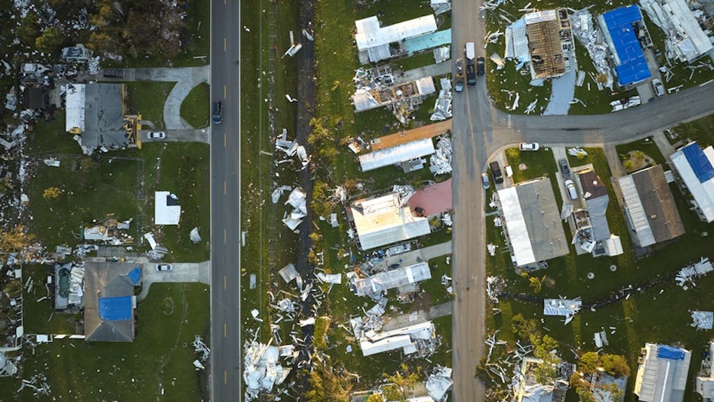 Aerial view of mobile home community after hurricane