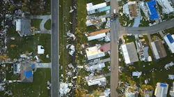 Aerial view of mobile home community after hurricane