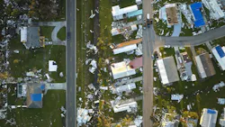 Aerial view of mobile home community after hurricane