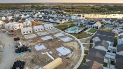 Aerial view of a suburban housing development under construction Aerial view of a suburban housing development under construction