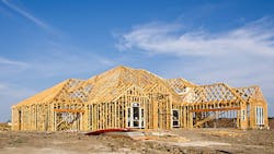 New construction framing against a blue sky New construction framing against a blue sky