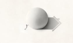 Hero image of a man pushing a ball, making a shadow of a home for Pro Builder Insurance feature Hero image of a man pushing a ball, making a shadow of a home for Pro Builder Insurance feature