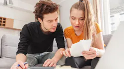 Concerned renters looking over their budgets