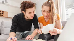 Concerned renters looking over their budgets Concerned renters looking over their budgets