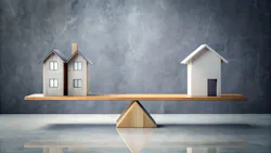 Houses on a scale indicate a balanced housing market