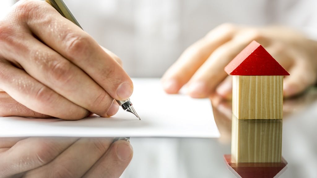 Homebuyer fills out mortgage application