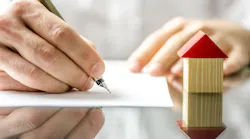 Homebuyer fills out mortgage application