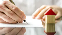Homebuyer fills out mortgage application