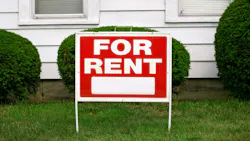 'For rent' sign in a front yard