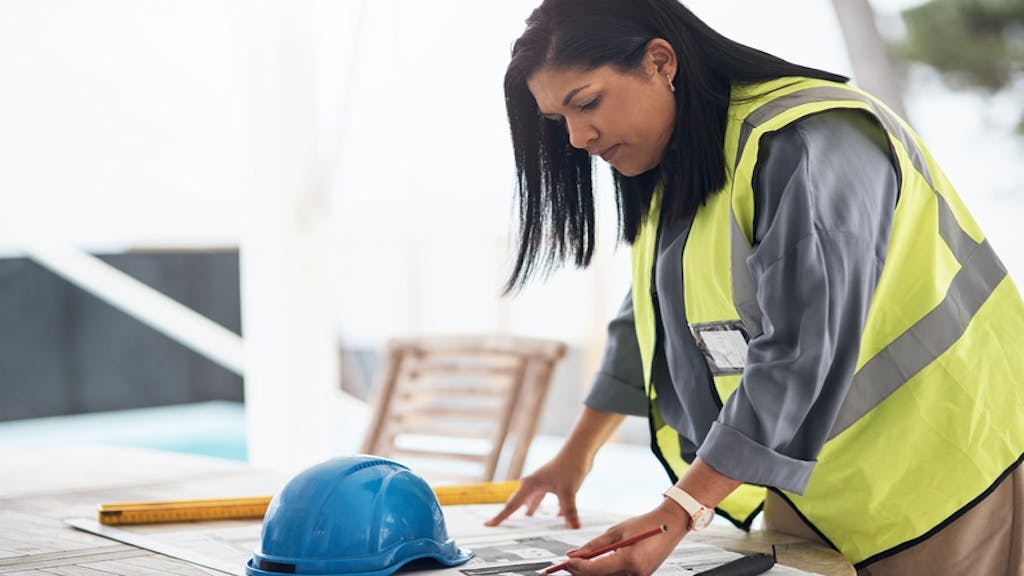 Builder going over plans