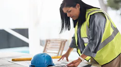 Builder going over plans