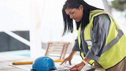 Builder going over plans Builder going over plans