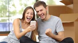 Young homebuyers celebrate their purchase