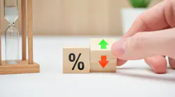 The concept of changing falling mortgage rates shown on wooden blocks