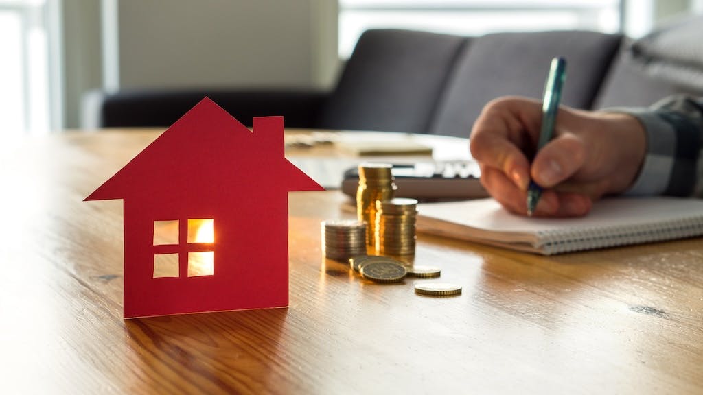 Homebuyer making a mortgage payment