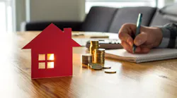 Homebuyer making a mortgage payment