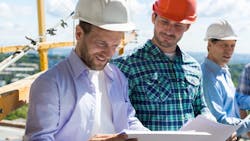 Home builders working on a project together Home builders working on a project together