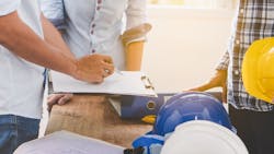 Housing industry pros in a meeting Housing industry pros in a meeting