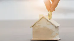 Concept putting money into a house