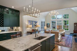 The home's contemporary open floor plan leads to an extensive outdoor living area, including a pool. The home's contemporary open floor plan leads to an extensive outdoor living area, including a pool.