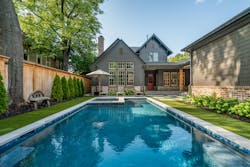 The outdoor area also is accessible from the home's rear-loading garage through a breezeway that connects the garage to the main house. The outdoor area also is accessible from the home's rear-loading garage through a breezeway that connects the garage to the main house.