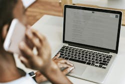 Homebuyer looking over AR Homes' website Homebuyer looking over AR Homes' website