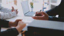 Homebuyers meeting with a real estate agent to learn their options Homebuyers meeting with a real estate agent to learn their options