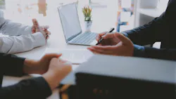 Homebuyers meeting with a real estate agent to learn their options Homebuyers meeting with a real estate agent to learn their options