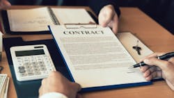 A homebuyer debates on whether or not to sign a contract A homebuyer debates on whether or not to sign a contract