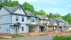 A row of newly completed single-family homes A row of newly completed single-family homes