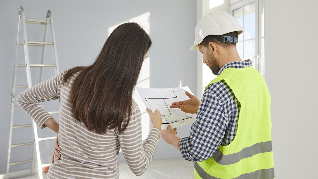 Home builder shows design concepts to client