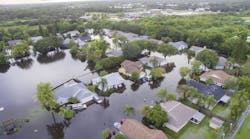 Homes damaged by flood in Sarasota, Fla. Homes damaged by flood in Sarasota, Fla.