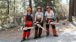 Team Rubicon volunteers holding chainsaws from STIHL Team Rubicon volunteers holding chainsaws from STIHL