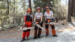 Team Rubicon volunteers holding chainsaws from STIHL Team Rubicon volunteers holding chainsaws from STIHL