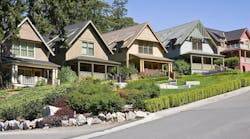 Row of homes on a hilly street Row of homes on a hilly street