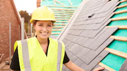 A female construction worker at a jobsite A female construction worker at a jobsite