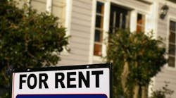 'For Rent' sign in front of a home 'For Rent' sign in front of a home
