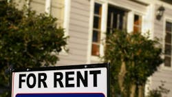 'For Rent' sign in front of a home 'For Rent' sign in front of a home