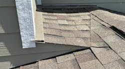 A properly formed cricket extends past the wall and directs water away from the roof-to-wall intersection A properly formed cricket extends past the wall and directs water away from the roof-to-wall intersection