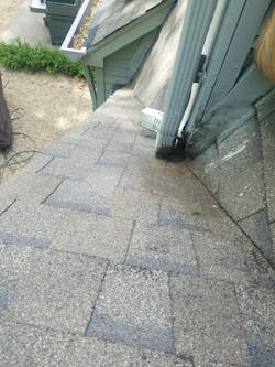 Evidence of water damage from poorly formed cricket Evidence of water damage from poorly formed cricket