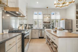 Extra shelving underneath the island adds more storage space. Extra shelving underneath the island adds more storage space.