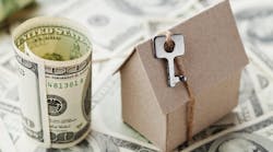 Model home sits among pile of cash Model home sits among pile of cash