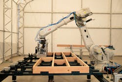 Cosmic Buildings' robot at work in their Palisades micro-factory Cosmic Buildings' robot at work in their Palisades micro-factory