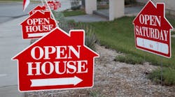 Red signs reading 'Open House' indicate a nearby home for sale Red signs reading 'Open House' indicate a nearby home for sale