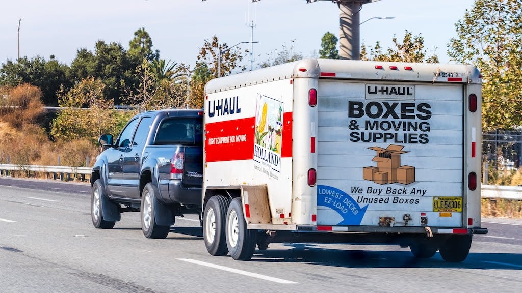 U-Haul truck driving down a highway